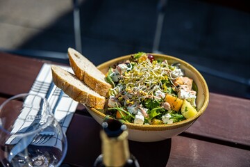 Closeup view of a delicious salad with a bread