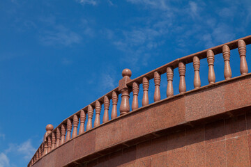 Granite balustrades railing made of red granite. Architectural elements.
