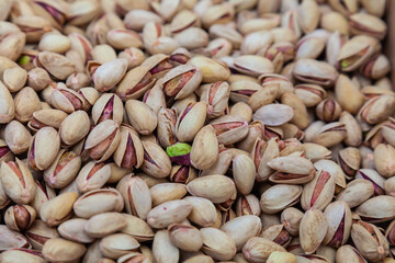 Pistachio nuts are sold at the market - 784358573