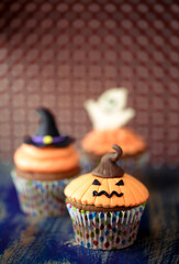Halloween design cupcake on dark background