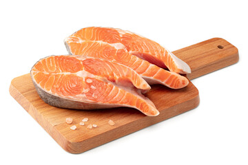 slice of raw fish, salmon, trout, steak, on wooden board isolated on white background, clipping path