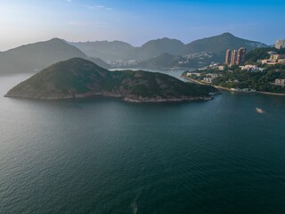 Fototapeta na wymiar Scenic view of the blue ocean at the sunset in Repulse Bay, Hong Kong, South East Asia