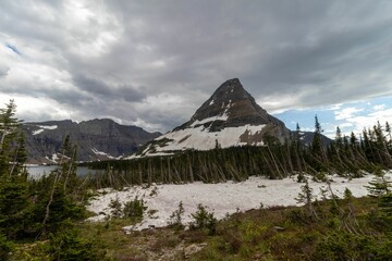 Amazing shot of a mountain covered in snow in Glacier National Park in Montana, USA
