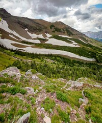 Vertical shot of beautiful rocky mountain scenery in Glacier National Park Montana