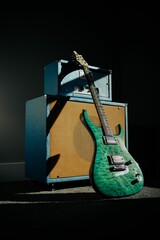 Vertical shot of a green electric guitar