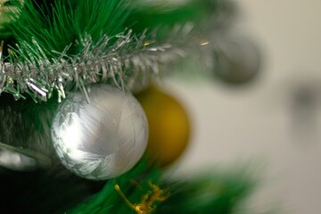 Closeup of ball toys on a Christmas tree