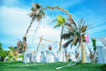 Scenic view of a beautifully decorated outdoor wedding venue seen on a bright sunny day