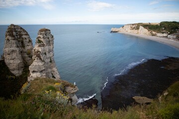 Fototapeta premium Beautiful seascape with white cliffs on the coast of Etretat, France