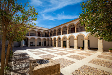 Generic view of the baroque cloister of the Sanctuary of Vera Cruz in Caravaca, Region of Murcia, Spain with midday light