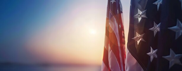 The American flag is displayed in the sun setting - Powered by Adobe