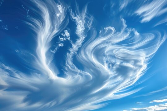 A serene image of a large cloud in the blue sky. Perfect for nature backgrounds