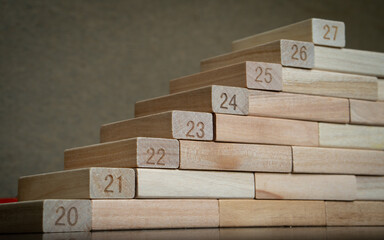 wooden blocks numbering of year 2020, 2021, 2022, 2023, 2024, 2025.... the concept of progress on...