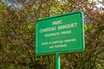Geneva, Switzerland - April 5, 2024: Parc Chateau Banquet - The Park of Banquet castle. Green Signboard