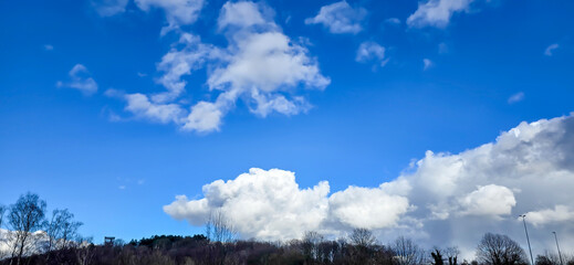 Blue sky background. Natural background. Panorama sky with tiny clouds