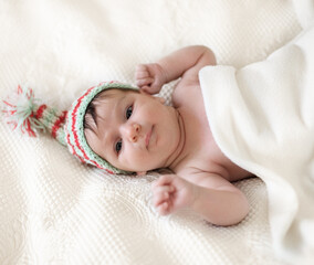 Portrait of a baby in knitting hat