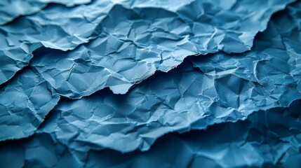   A tight shot of a paper stack with numerous blue sheets on top