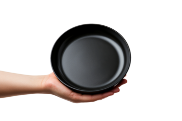 A Culinary Creation: Hand Masterfully Wielding a Black Frying Pan. On White or PNG Transparent Background.