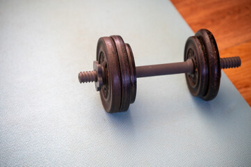 Weights on exercise mat