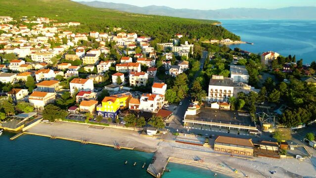 Selce is a picturesque coastal village nestled along the Adriatic Sea in Croatia, renowned for its stunning beaches, charming promenade, and relaxed atmosphere captured  by drone