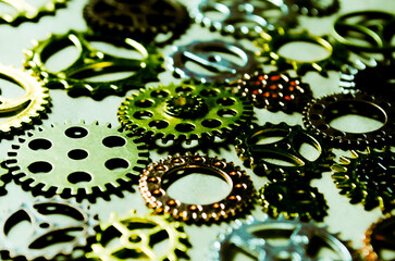 Metal gears on craft background Side view Men concept Dad day template Technical texture Vintage style Abstract retro industrial steampunk surface Bronze gray gold cogwheels