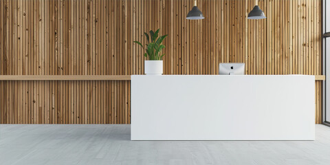 Interior of white reception desk against wood wall
