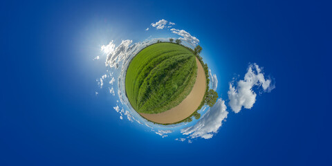 in the center of a green field lampertheim germany hessen 360° little planet altitude 125 meter