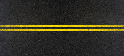 Bandes jaunes sur asphalte 