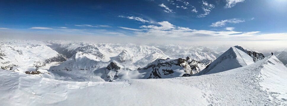 Ski tour to the Piz Pal&uuml; in the Bernina group in the canton of Graub&uuml;nden. Ski mountaineering on mountain peak Piz Pal&uuml; over glacier in a fantastic mountain world. High quality photo