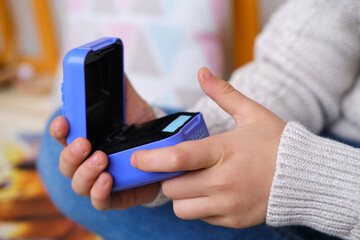 Spin Master Bitzee interactive pet game, interactive toy for children Tamagotchi halogram pet on color screen, children's entertainment, Frankfurt - October, 28, 2023