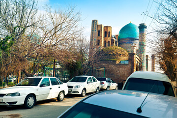 Narrow street in the heart of Samarkand - view of Bibi Khanym Mosque. Uzbekistan