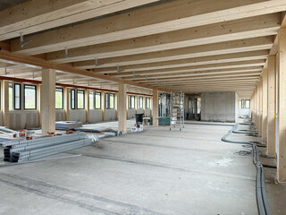 construction site of a sustainable Timber-concrete composite office building.