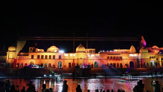 Stunning laser light show at temple wall at night from different angle