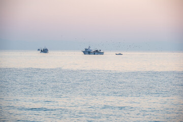 Fishing boat at sunset