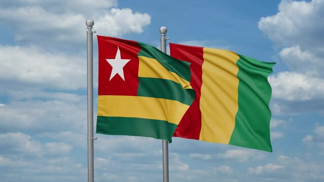 Republic of Guinea and Togo two flags waving together, looped video, two country relations concept