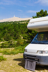 Caravan in mountains. Mont Ventoux in the distance. Provance - obrazy, fototapety, plakaty