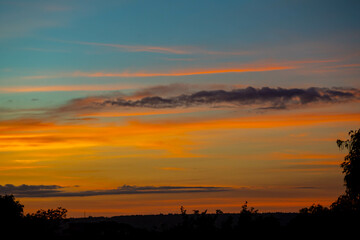 Early morning sky with multicolored clouds