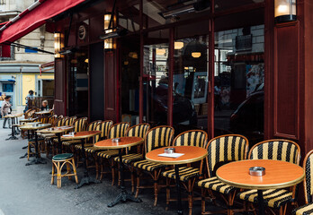 Cozy street with tables of cafe in quarter Montmartre in Paris, France - 784523577