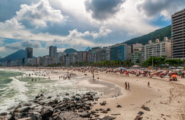 Copacabana beach and Leme in Rio de Janeiro, Brazil. Copacabana beach is the most famous beach in Rio de Janeiro. Sunny cityscape of Rio de Janeiro - 784524109