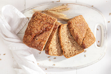 Square loaf of rye bread baked with rye and barley.