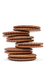 Chocolate cookies with cream filling on white background.