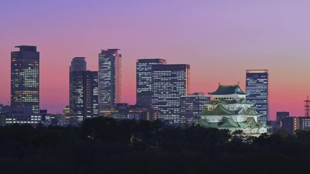 Time lapse movie of modern city and trains twilight view. Nagoya, Japan.