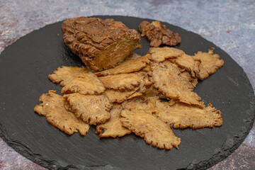 Vegan seitan or mock meat, made with gluten,  ham shaped.