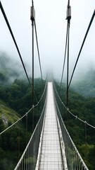 Fototapeta premium The bridge over the abyss in the fog.