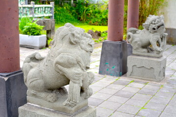 A pair of stone lions guarding Lin Antai Ancient House Folk Culture Museum