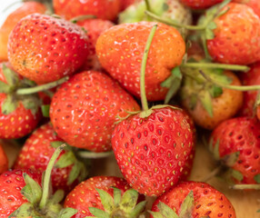 Red ripe strawberries background. Close up, top view.