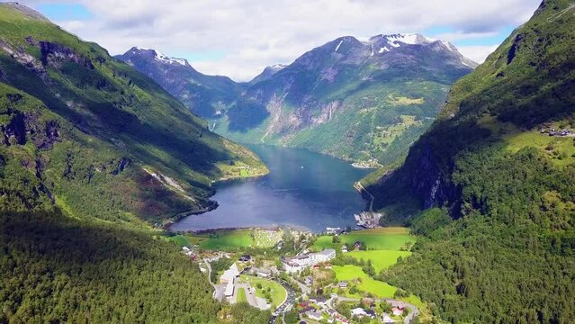 Geirangerfjord and Geiranger village aerial panoramic view in Norway
