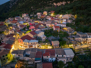 Fototapeta na wymiar Aerial drone view of traditional Episkepsi village in north corfu,Greece by night, Summer time