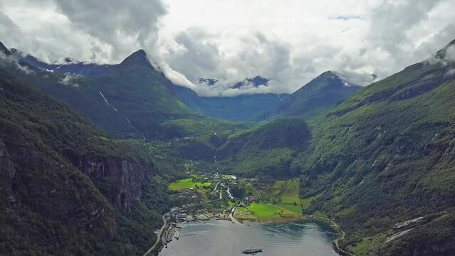 Geirangerfjord and Geiranger village aerial panoramic view in Norway