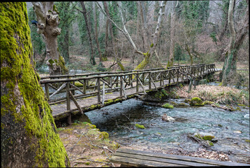 Wooden bridge at the Agios Nikolaos Park at the city of Naousa in Macedonia, Greece
