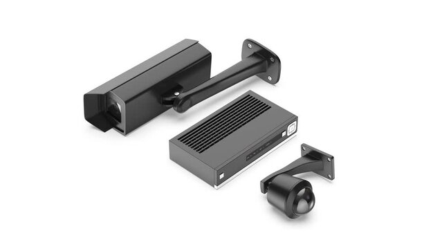 Black video surveillance cameras and digital video recorder on white background